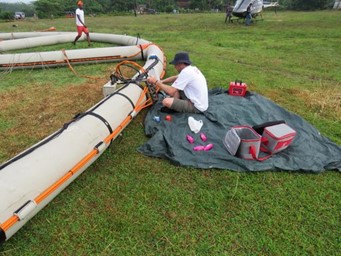 Crew preparing the Xcite system